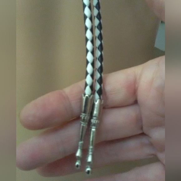 VINTAGE BOLO TIE W/ BLACK & WHITE BRAID SILVER TONE (1997) SYMBOL PCS HEALTH SYS - Picture 4 of 5